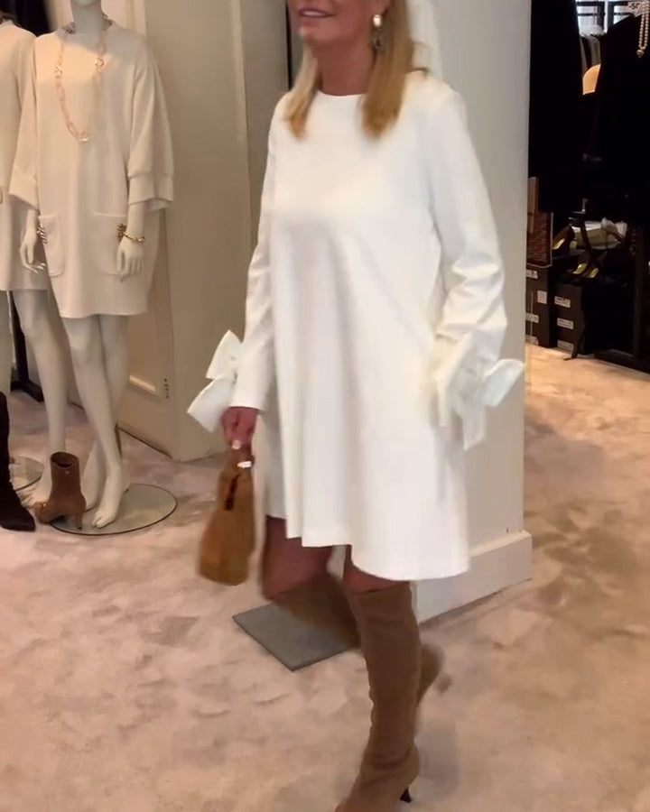 NIA – ELEGANT BOW-SLEEVE MINI DRESS